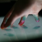 Z-touch: A multi-touch system for detecting spatial gestures near the tabletop